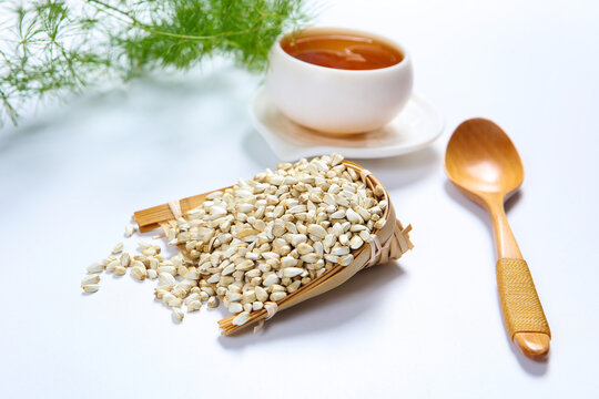 Dried Safflower Seeds in Wooden Bowl Herbal Tea Scene