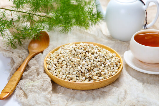 Dried Safflower Seeds in Wooden Bowl Herbal Tea Scene