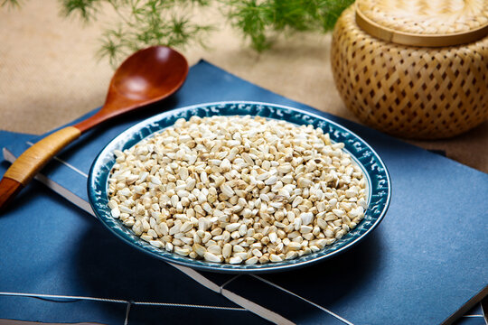 Dried Safflower Seeds in Wooden Bowl Herbal Tea Scene