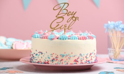 Obraz premium Baby gender reveal party. Tasty cake with decor and cookies on light grey table, closeup