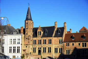 Obraz premium Facade of Maison de la Guilde des tanneurs (House of the Tanners' Guild) located next to the Dijver Canal on the Huidenvettersplein in Bruges, Belgium.