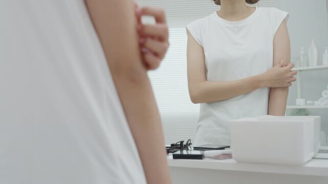 skin problem and beauty. Young woman scratch body has itchy skin from skin allergic, steroid allergy, sensitive skin, red from sunburn, chemical allergy, rash, insect bites, Seborrheic Dermatitis.