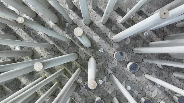 Aerial Starogard Poland WWII monument climb. 7,000 Polish civilians, intellectuals, Jews, and psychiatric patients murdered during WW II. Memorial is mass graves. Historical.