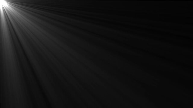 Bright volumetric light rays shining from top left corner on a dark background creating glowing sunbeam effect for video overlay and motion design background,and 4k motion graphics animation.