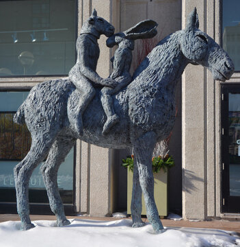 MONTREAL QUEBEC CANADA: Lovers on Horseback, Bronze by Sophie Ryder was born in London, England, in 1963. She studied Combined Arts at the Royal Academy of Arts 