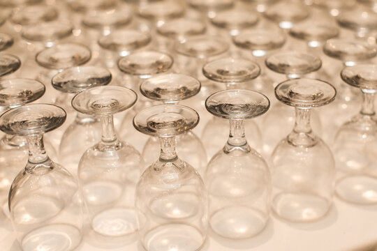 Many Clean washed Clear Wine Glass cups stacked 
