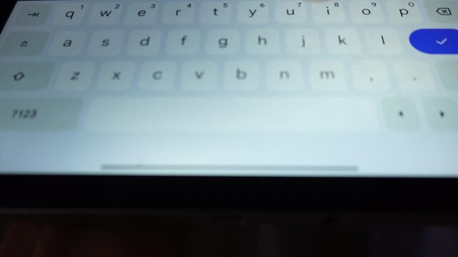 Macro Close Up of Fingers Typing on Glowing Virtual Touchscreen Keyboard - Tech Video Footage