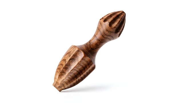 Wooden citrus reamer with carved flutes stands angled against a clean white background highlighting its texture.