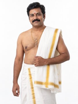South Indian Man in Traditional Dhoti and Angavastram
