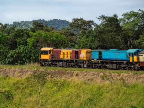  Two Colorful Diesel Electric Locomotives