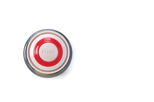 close-up top-view shot of a thermos inner cap stopper featuring a red ring design and a white push button labeled PUSH