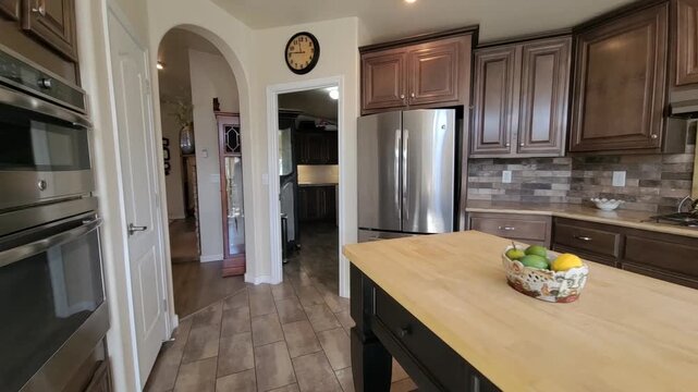 Bright Modern Kitchen with Island and Stainless Appliances