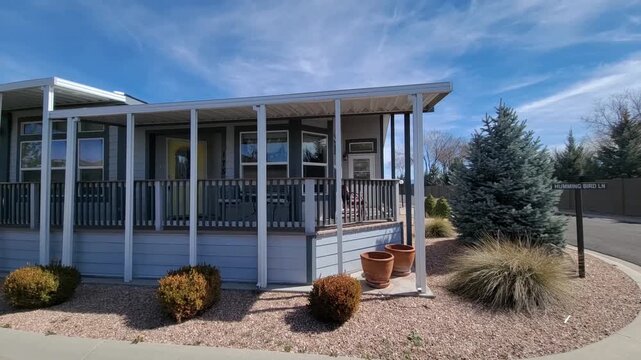 Modern storefront with covered porch on desert street