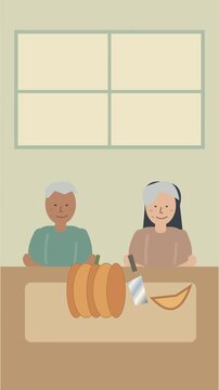 Couple senior pr&eacute;parant et partageant une citrouille dans une cuisine chaleureuse