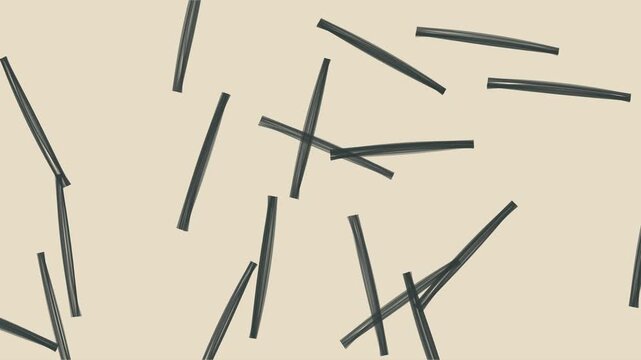 Coups de pinceau noirs dansant sur une toile claire en style stop motion