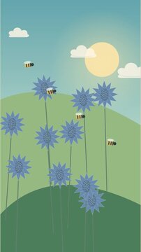 Abeilles butinant des fleurs bleues de panicaut maritime dans un jardin estival