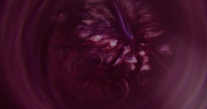 Blur paint spill. Glitter dye. Red purple pink color round rainbow shimmer water bright art liquid pour on abstract acrylic background.