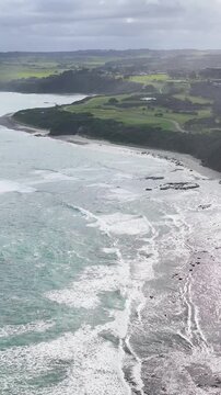 Aerial View of Waves Breaking on Flinders Coastline in Victoria
