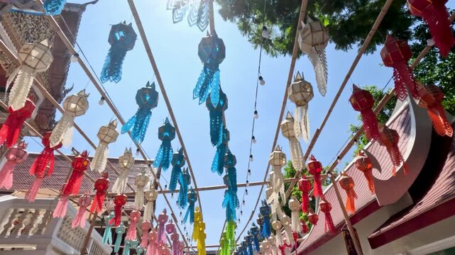 Colorful Lanna Lanterns Hanging Against Clear Blue Sky