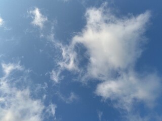 Obraz premium Blue Sky with Soft White Clouds and Natural Background