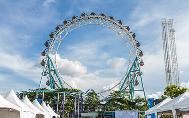 Fun Outdoor Festival and Theme Park with Giant Ferris Wheel © สุปรัชญา น้อยสุข