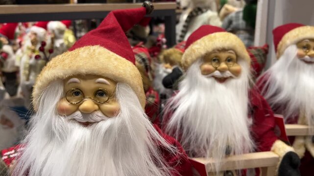 Santa Claus Figurines Close Up Shelf Display in Store | Christmas Holiday Decoration with Glasses and White Beard | Festive Retail Toys