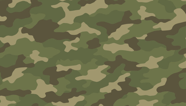 Seamless military camouflage pattern background with khaki green tan and brown spots suitable for army clothing texture.