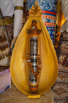 Traditional Sasando musical instrument from Rote, Indonesia, featuring a distinctive palm leaf resonator and decorated central string section.