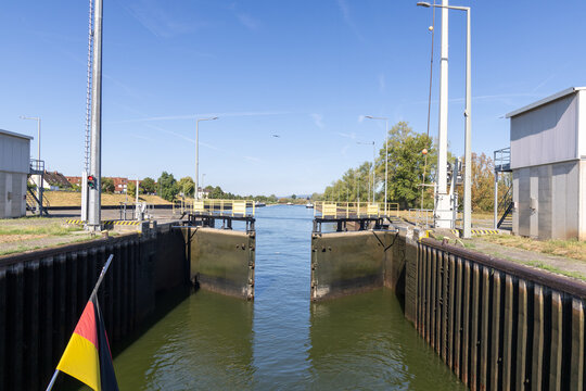 river lock on river Main in Kostheim, Hesse, Germany, with open sluice