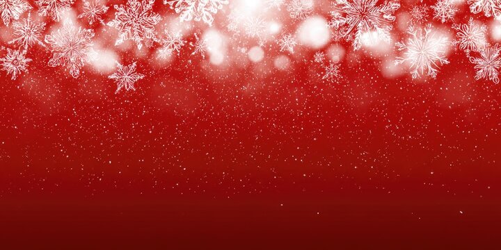 Red festive background with white snowflakes and sparkling light effects creating a winter holiday atmosphere.