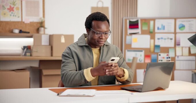 Ecommerce, man and typing in office with phone, search website data or good review for retail seller. Happy, black person and browse in small business with tech, app and stats for sales optimization.