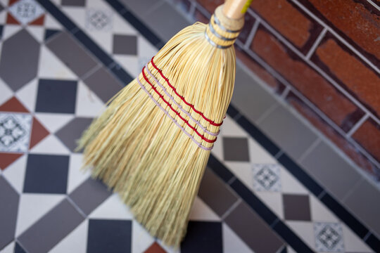 Traditional Straw Broom Sweeping Decorative Tile Floor