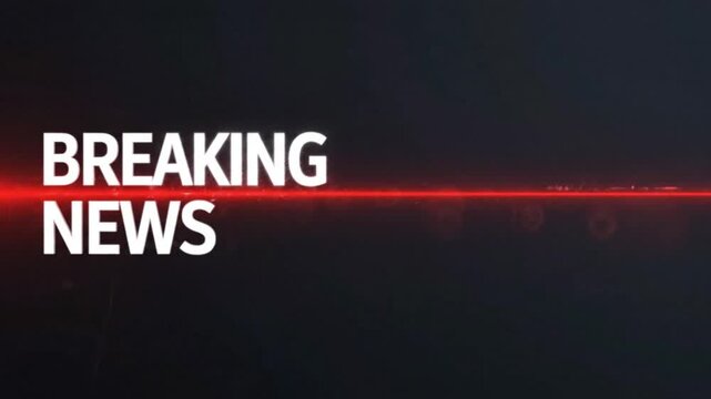 Breaking news text banner displayed over a dark background with a glowing red laser light streak.