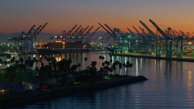 Port of Los Angeles Container Terminal and Cargo Ship Lit Up at Twilight California