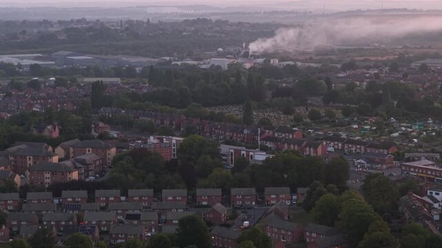 Aerial view of Wakefield, a cathedral city located on the River Calder in West Yorkshire, England, United Kingdom. Drone POV exploration of city centre and surrounding infrastructure in early mornings