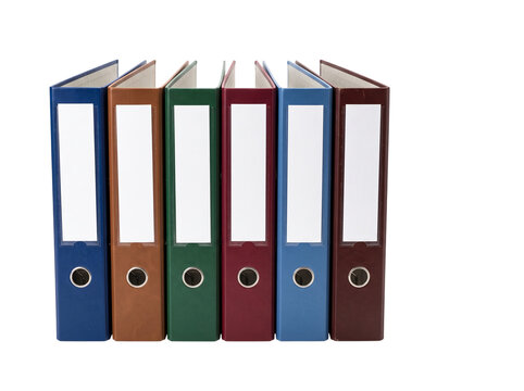 Six ring binders in assorted colors stand on transparent background
