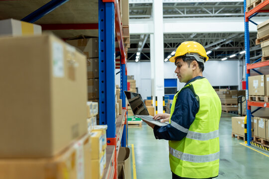 Portrait Warehouse worker, inventory and check stock product. Transport logistic business ship delivery to customer. stock card, bill of material, inspection, storehouse, storage, factory
