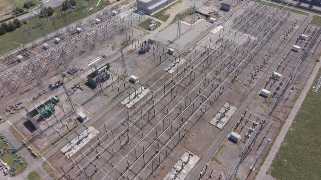Aerial view of a high-voltage electrical substation with grid equipment, Settimo Milanese, Milan, Italy