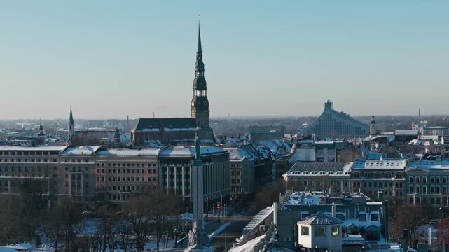Snowy Riga skyline frames civilian life, heritage and security on Europe's east