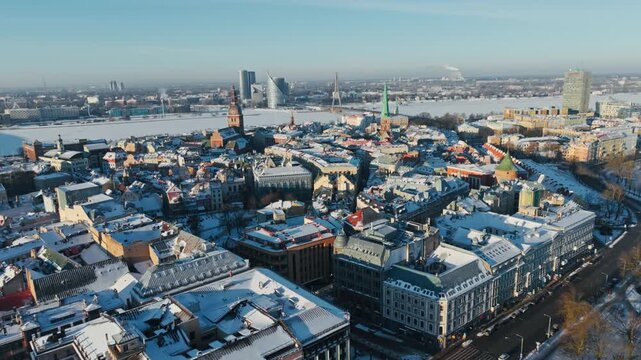 Snowy Riga skyline symbolizes civilian life protected on NATO's eastern frontier