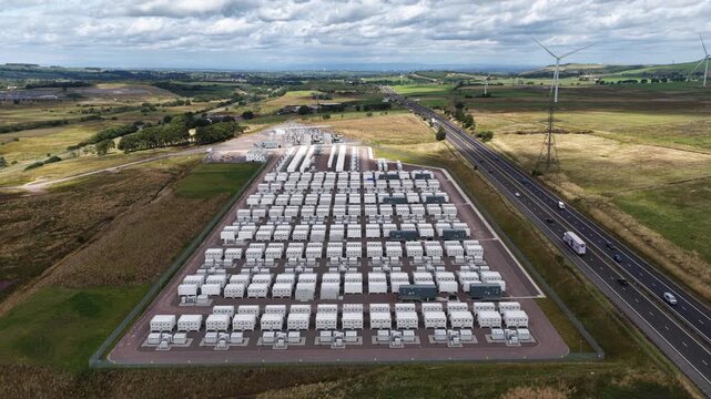 Drone view of Coalburn 1 in South Lanarkshire, Scotland, showing grid-scale battery storage supporting renewable power, wind integration and electricity balancing.
