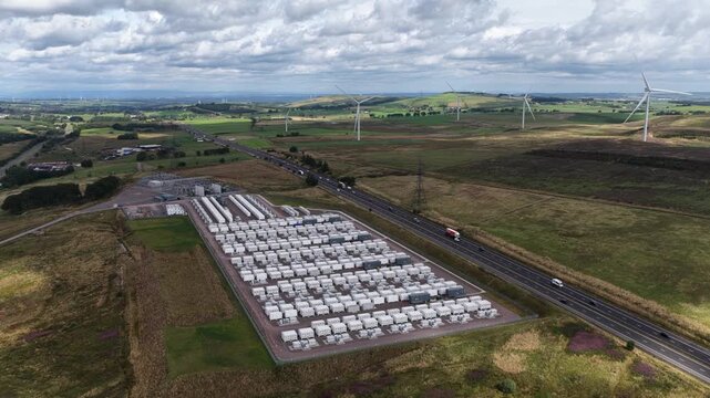 Drone view of Coalburn 1 in South Lanarkshire, Scotland, showing grid-scale battery storage supporting renewable power, wind integration and electricity balancing.
