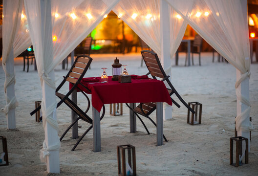 Romantic dinner scene with chairs and ready to serve before the meal
