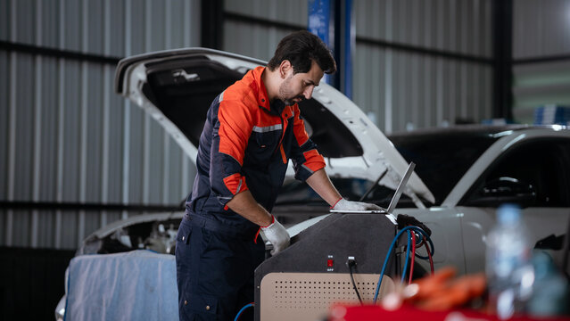 An automotive engineer working on electric vehicle propulsion