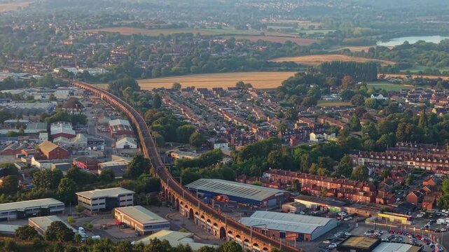 Aerial view of Wakefield, a cathedral city located on the River Calder in West Yorkshire, England, United Kingdom. Drone POV exploration of city centre and surrounding infrastructure.