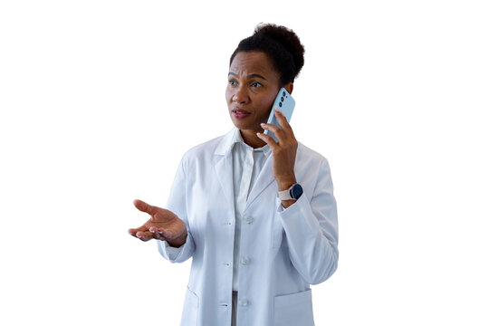 Businesswoman making phone call holding credit card