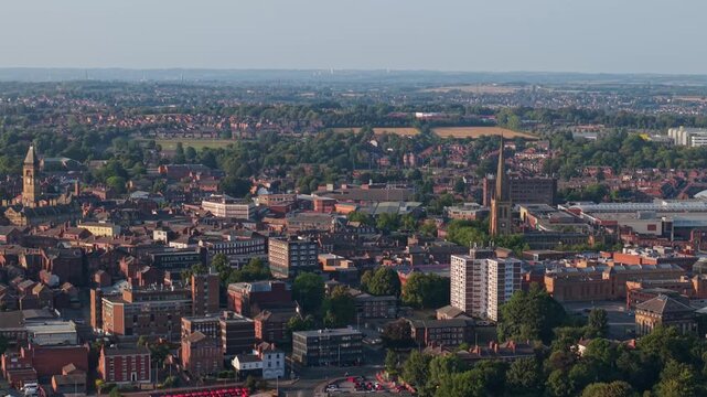 Aerial view of Wakefield, a cathedral city located on the River Calder in West Yorkshire, England, United Kingdom. Drone POV exploration of city centre and surrounding infrastructure.
