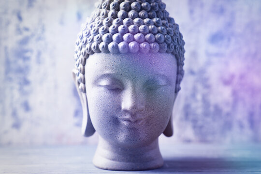 Meditating Buddha Statue on wooden background. Soft focus. Close up. Copy space