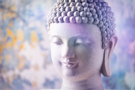 Meditating Buddha Statue on wooden background. Soft focus. Close up. Copy space