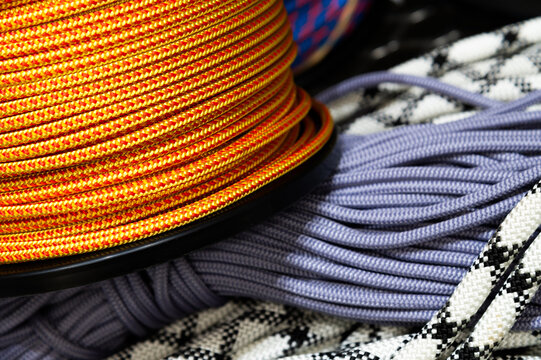 Coiled Climbing Ropes of Various Colors and Textures